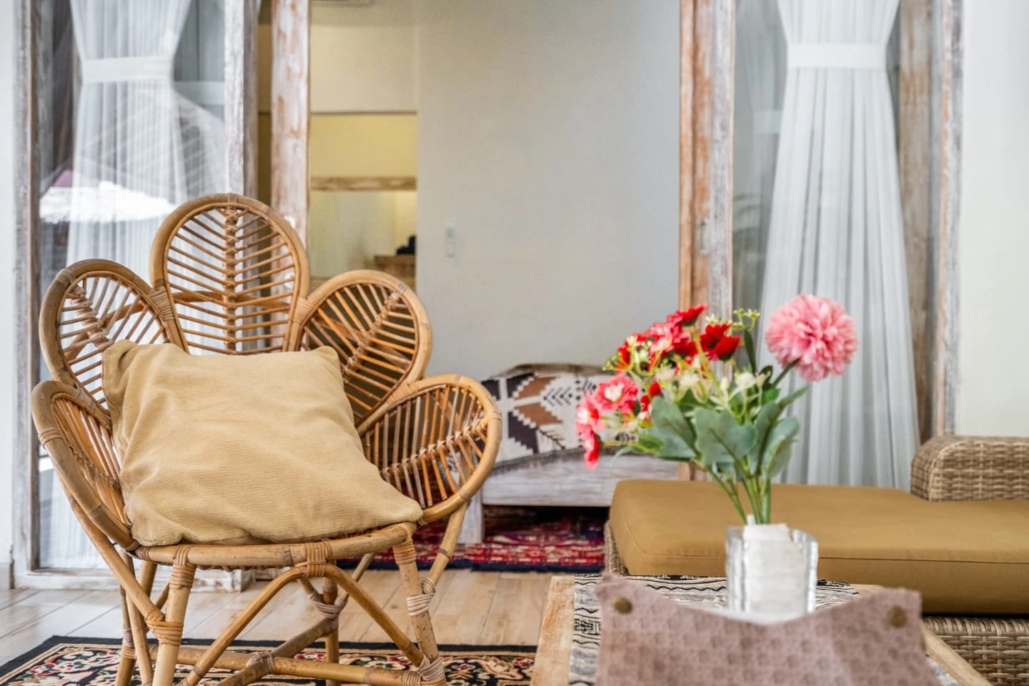 Rattan chair and flowers in the lounge